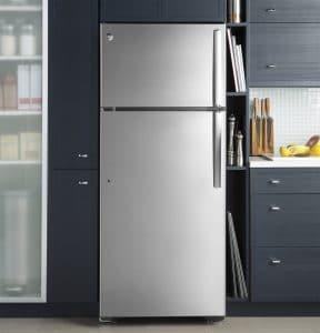 Kitchen interior with a stainless steel fridge