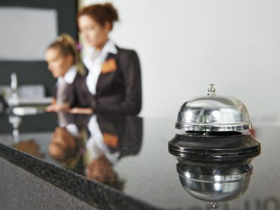 Modern luxury hotel reception counter desk with bell